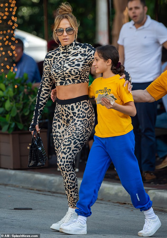 Jennifer Lopez flaunts toned tum for lunch with daughter Emme