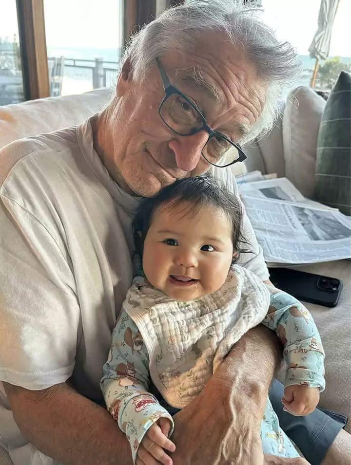 Robert De Niro, 80, and baby daughter Gia, 10 months, snuggle in rare family photo
